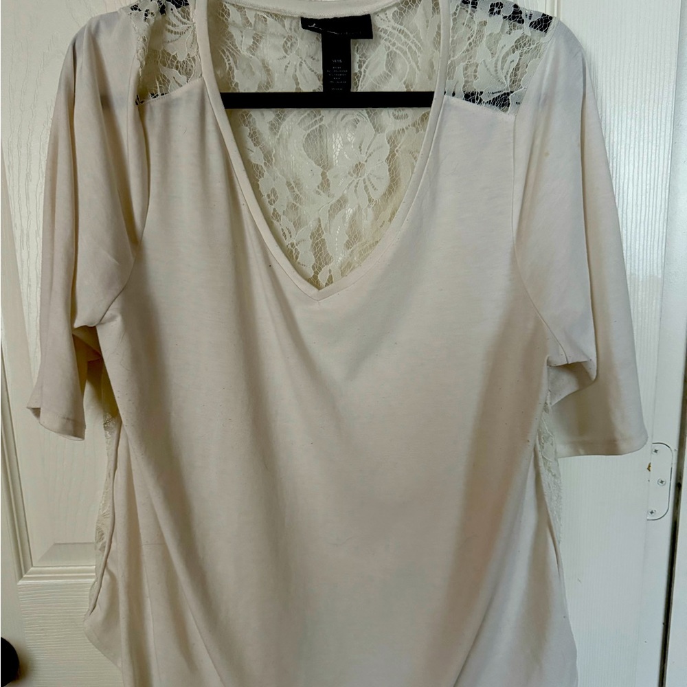 Lane Bryant V neck shirt with lace backing.